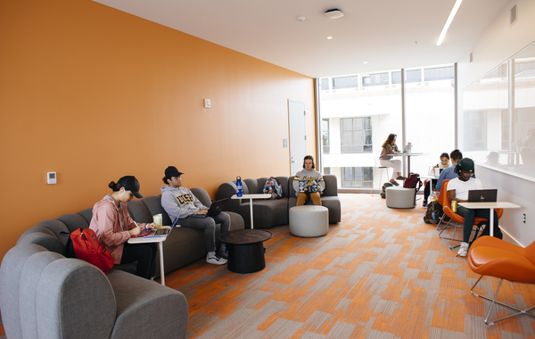 students inside of a building's study area 